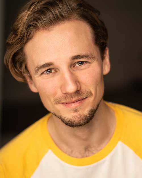 Headshot by Sam Mackay