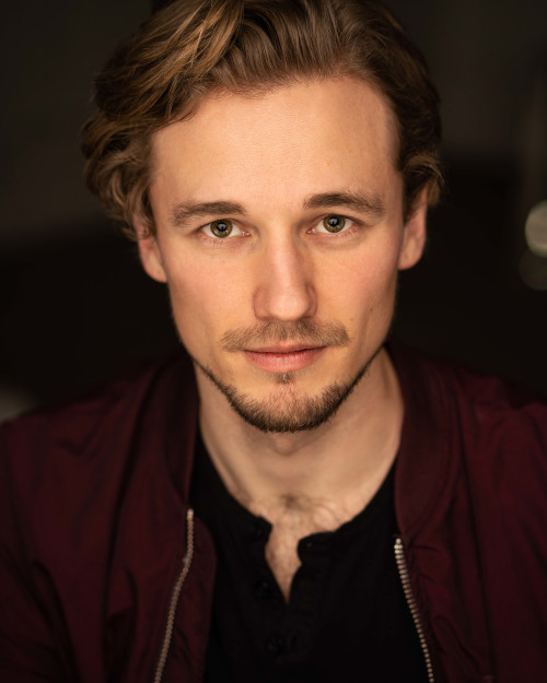 Headshot by Sam Mackay