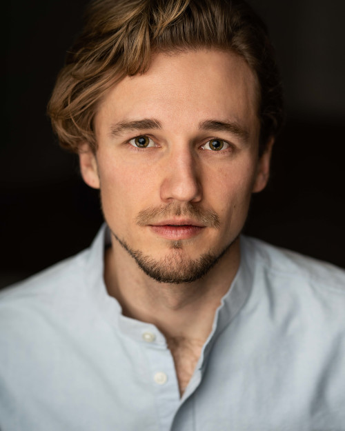 Headshot by Sam Mackay